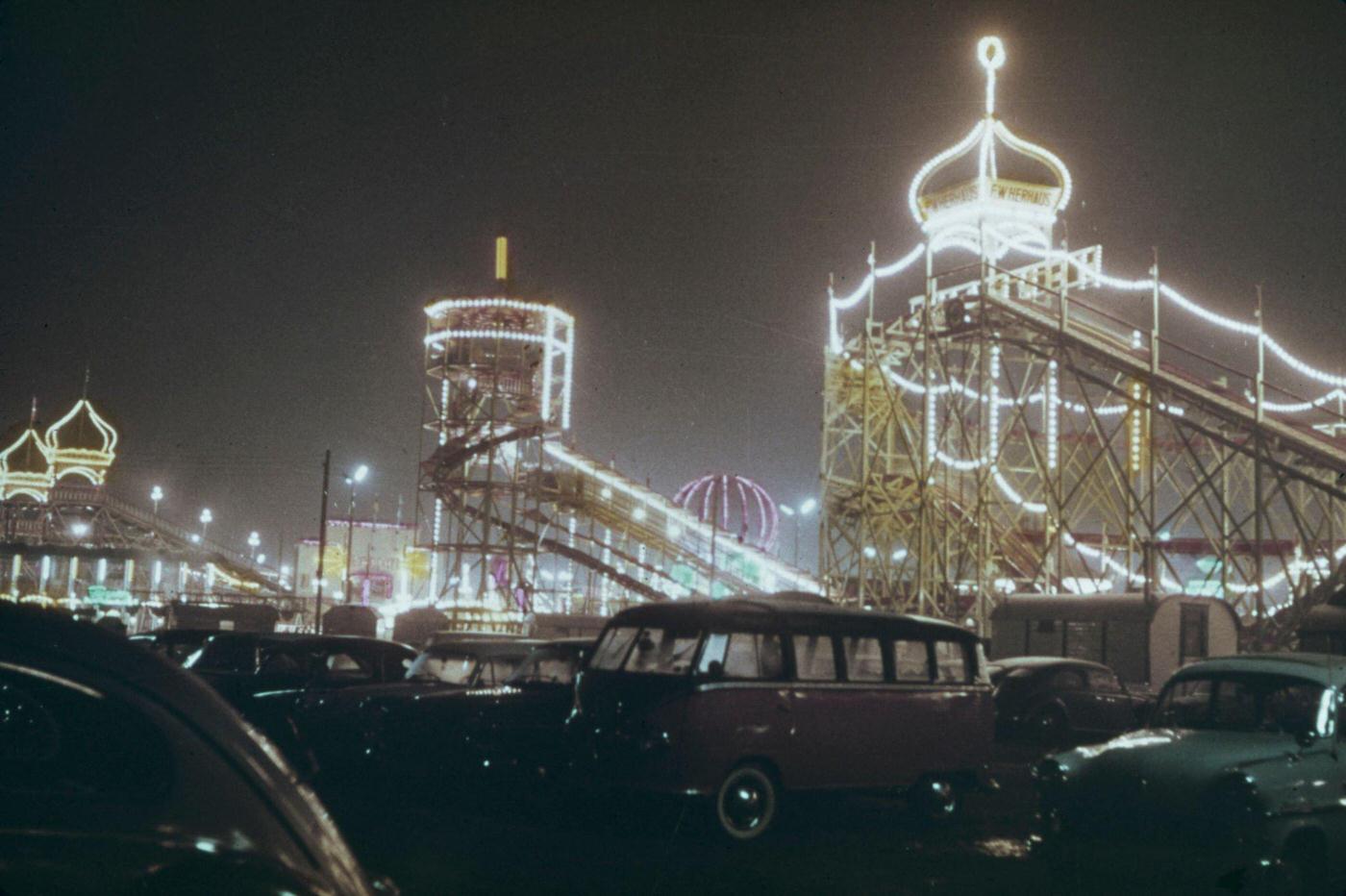 Illuminated fairground rides at Munich Oktoberfest, 1965.