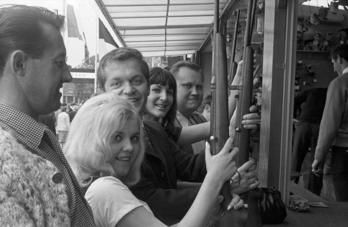 Celebrities Jessy, Maria Duval, Joe Raphael, Heinz Jürgens at Munich Oktoberfest. 1960s.