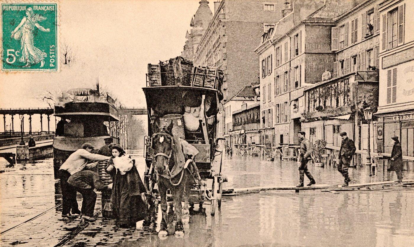 Vintage French postcard: devastation caused by Seine River flooding at Quai de Passy, Paris, circa January 1910.
