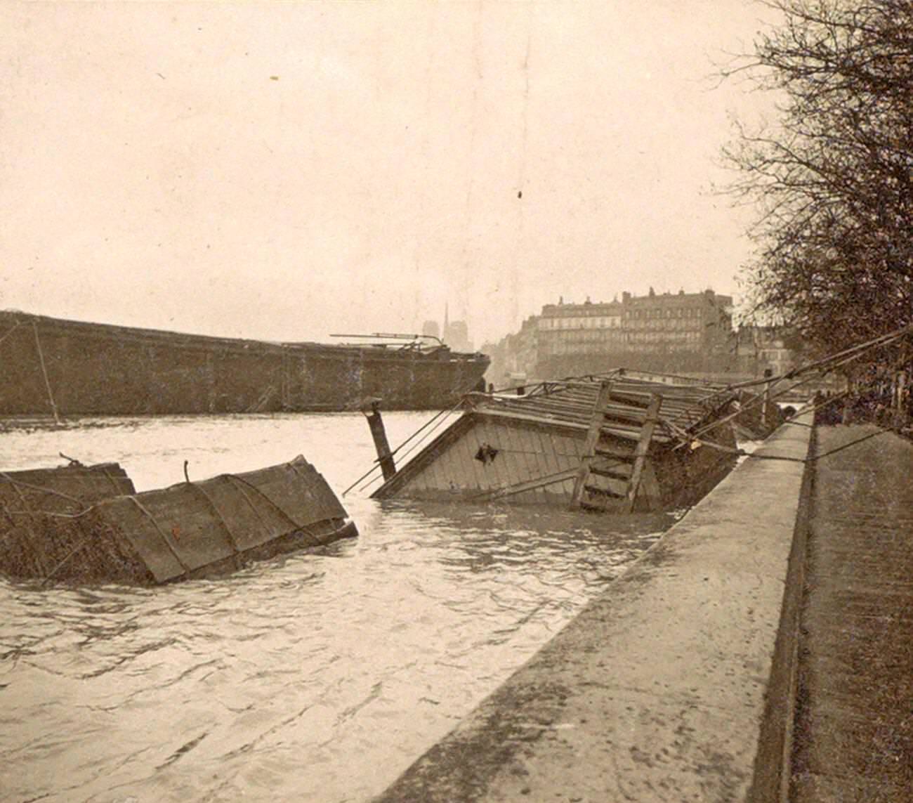 Sunken boat on the Seine River during Paris flood, 1910.