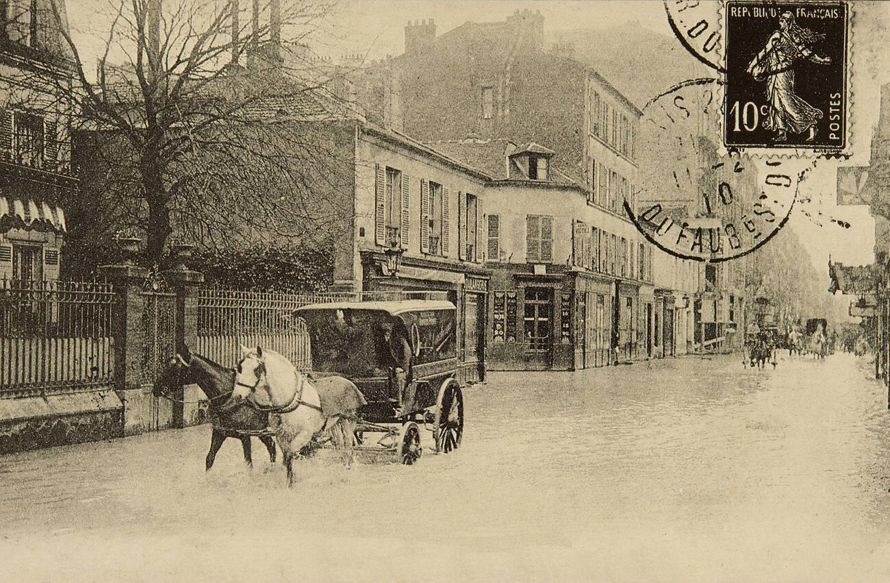 Photography - View of Paris, Street Lourmel during 1910 flood, baker in cart.