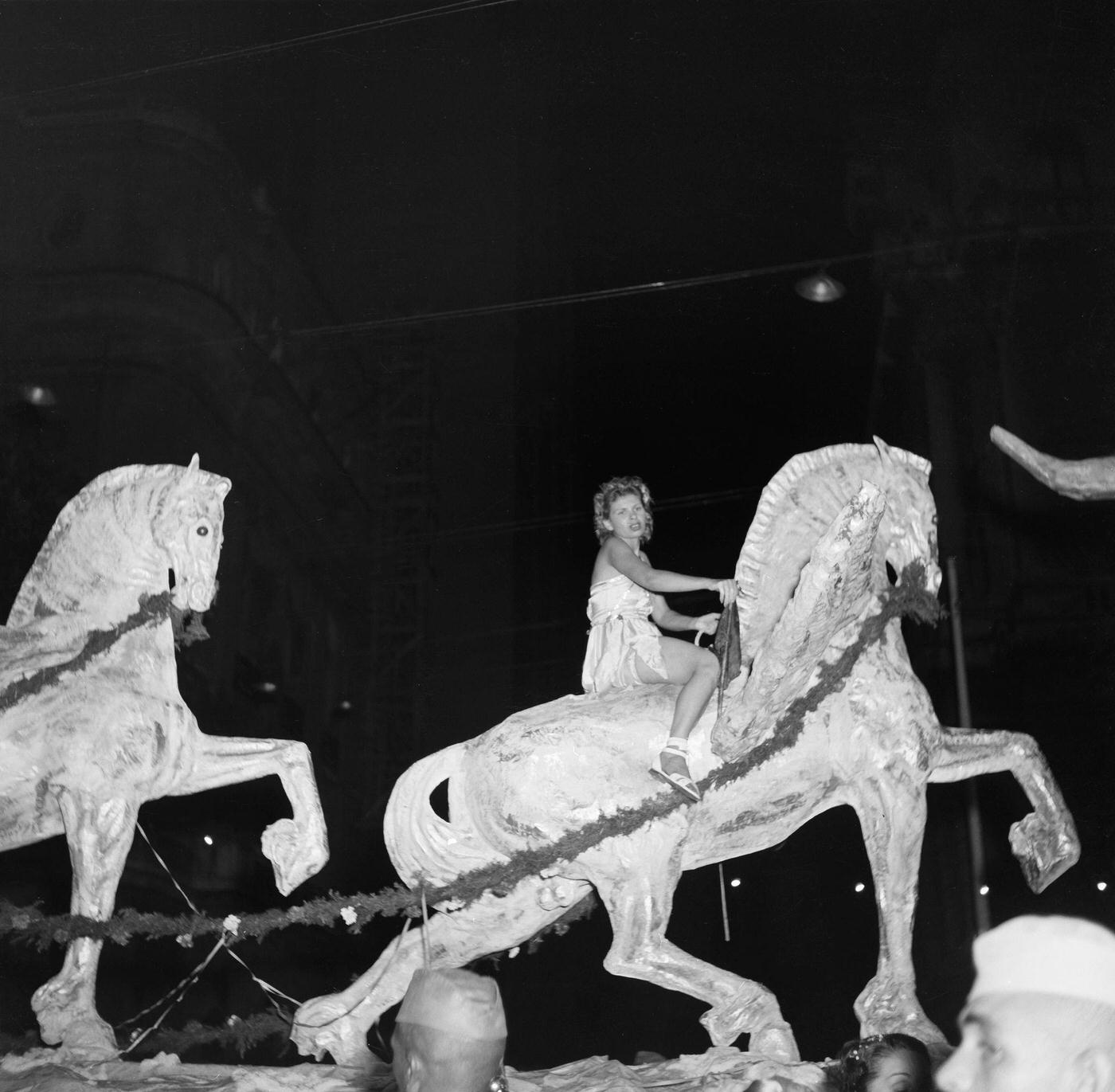 Carnival parade revelers on a float in Rio de Janeiro's Carnival. 1953