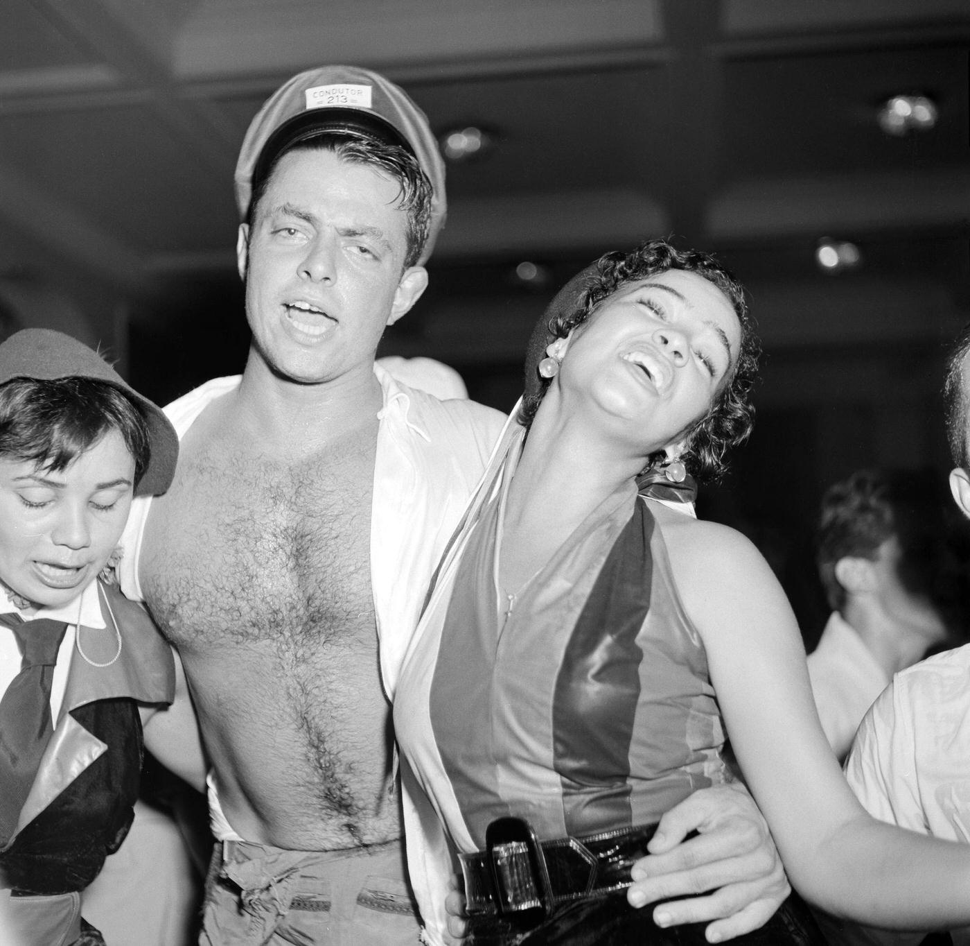 Carnival partygoers celebrate during Rio de Janeiro's Carnival. 1953