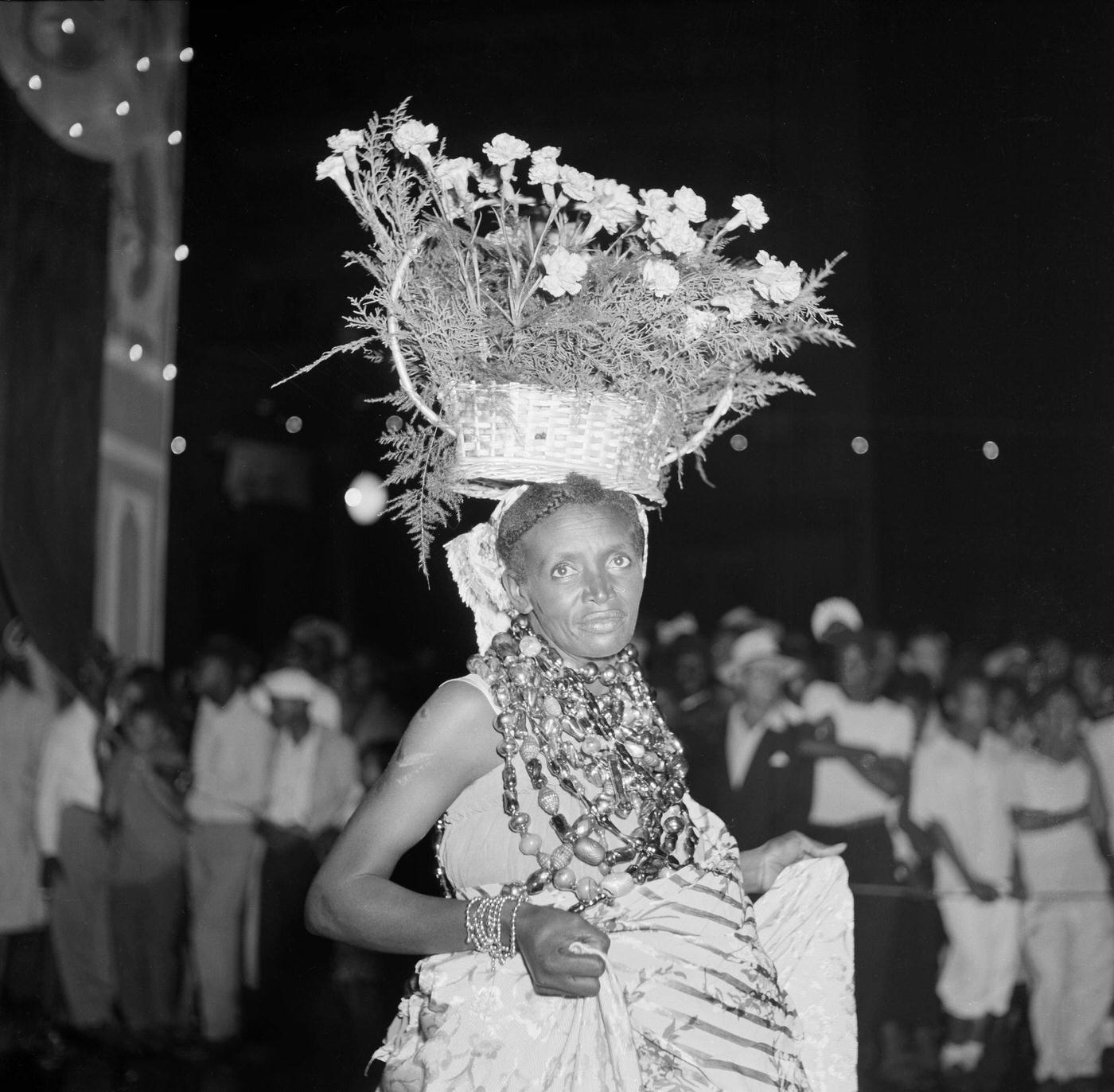 Reveler dances in the Carnival parade in Rio de Janeiro. 1953