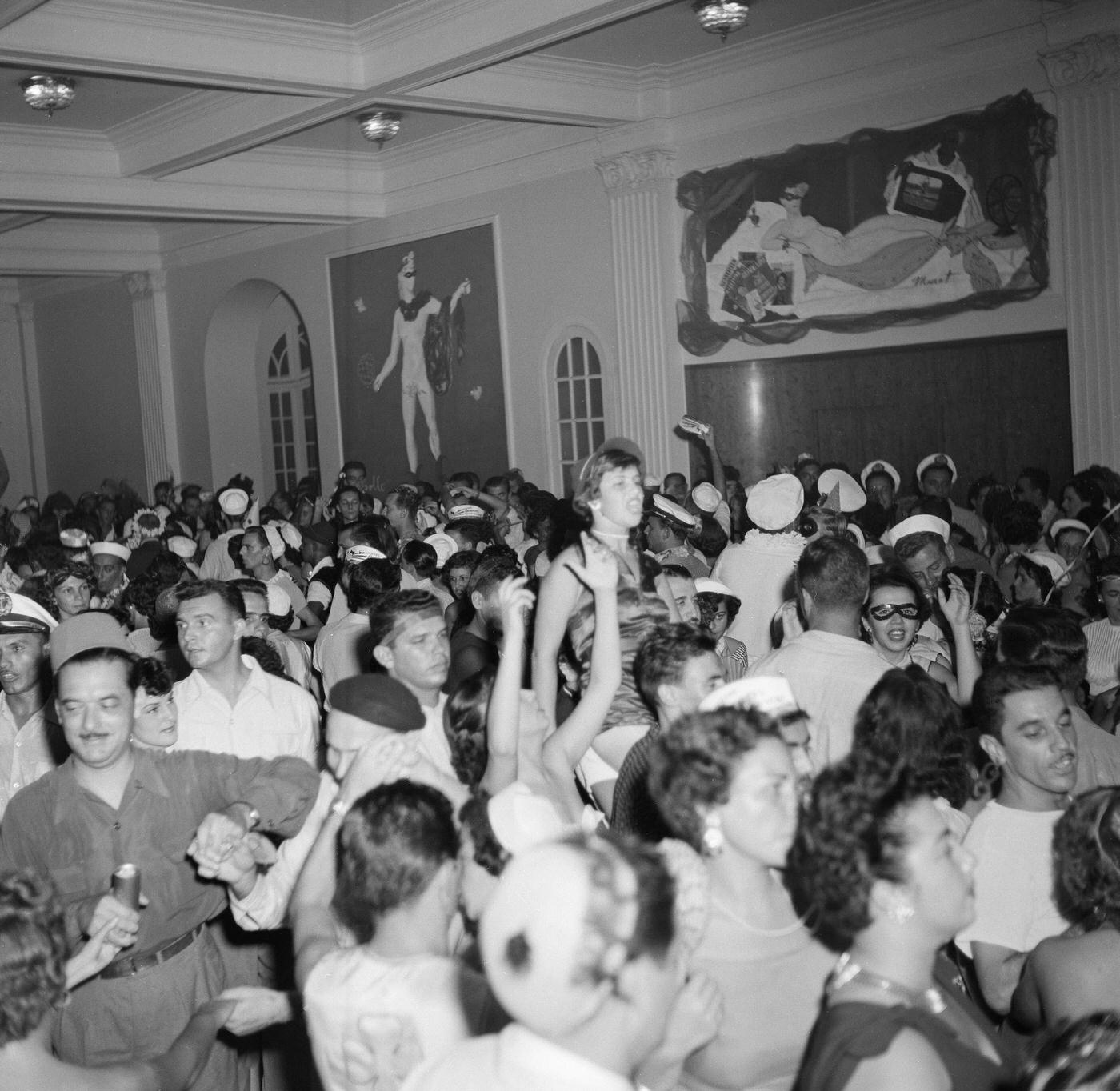 People dance and party during Rio de Janeiro's Carnival. 1953