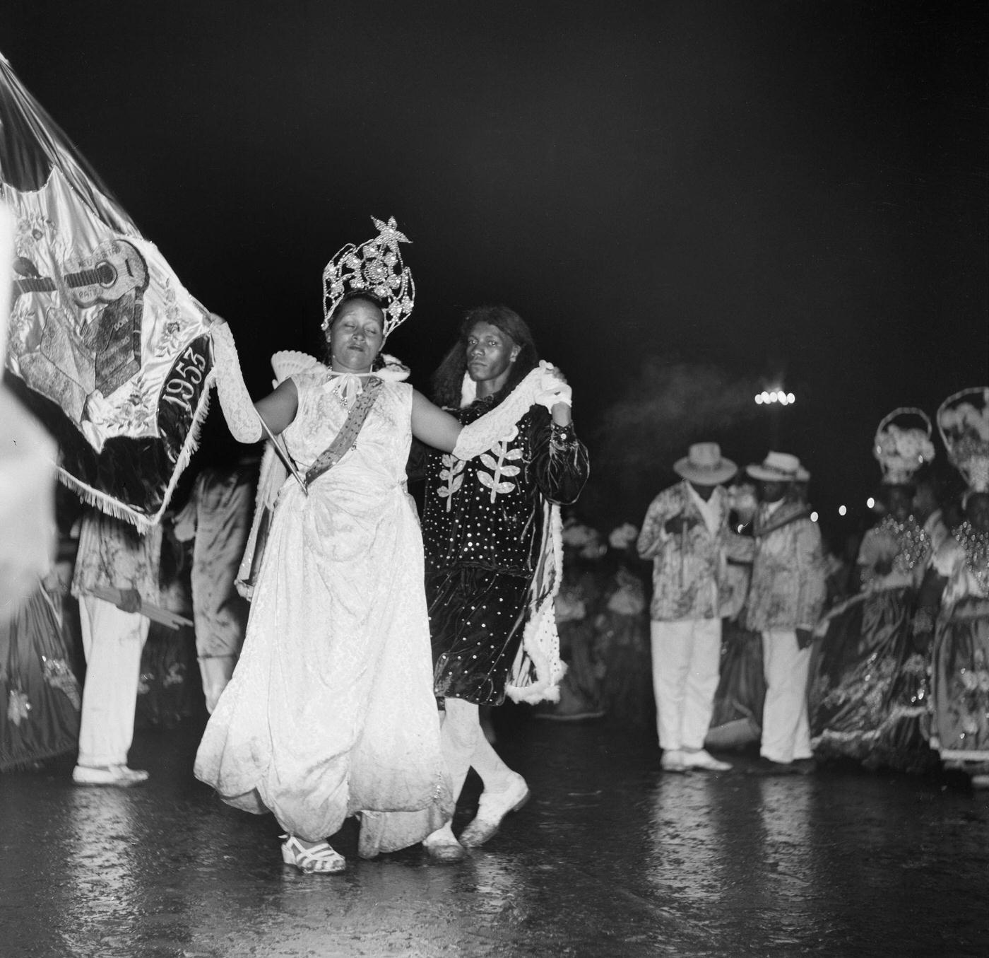 Revelers dance in the Carnival parade in Rio de Janeiro. 1953