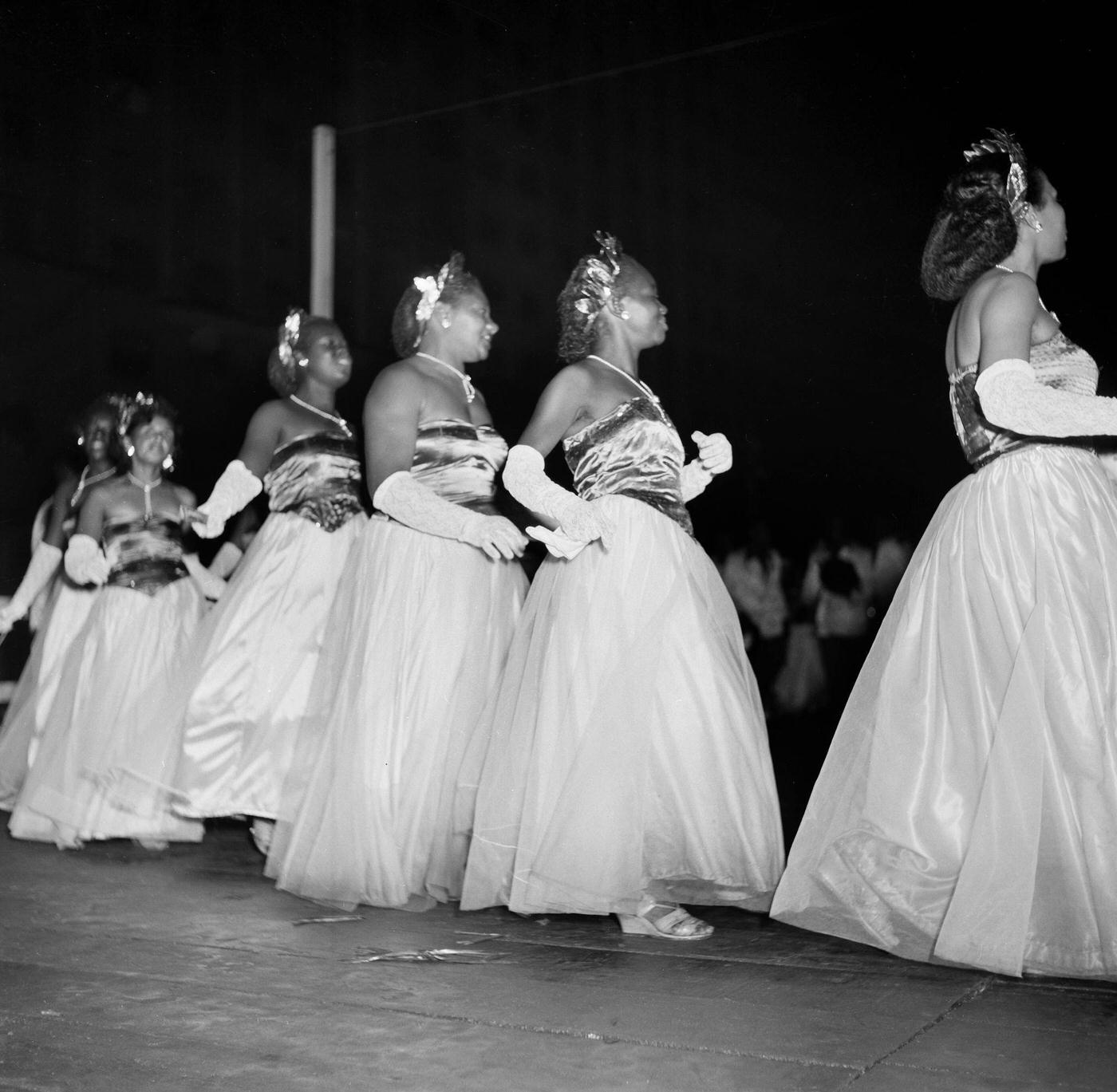 Carnival parade revelers dance in Rio de Janeiro's Carnival. 1953