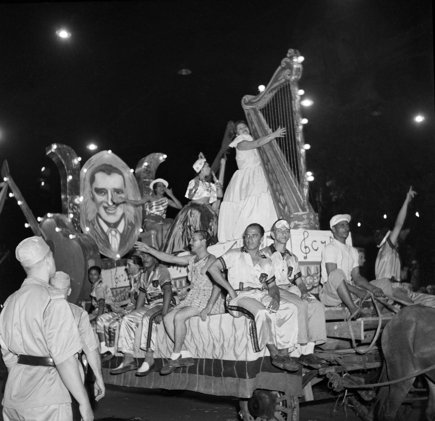 Carnival parade revelers on a float in Rio de Janeiro's Carnival. 1953