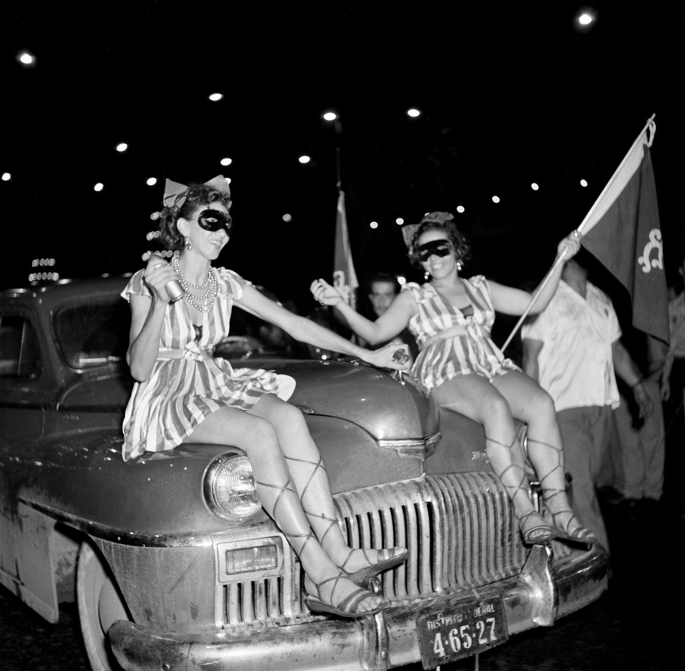 Carnival parade revelers on a float in Rio de Janeiro's Carnival. 1953