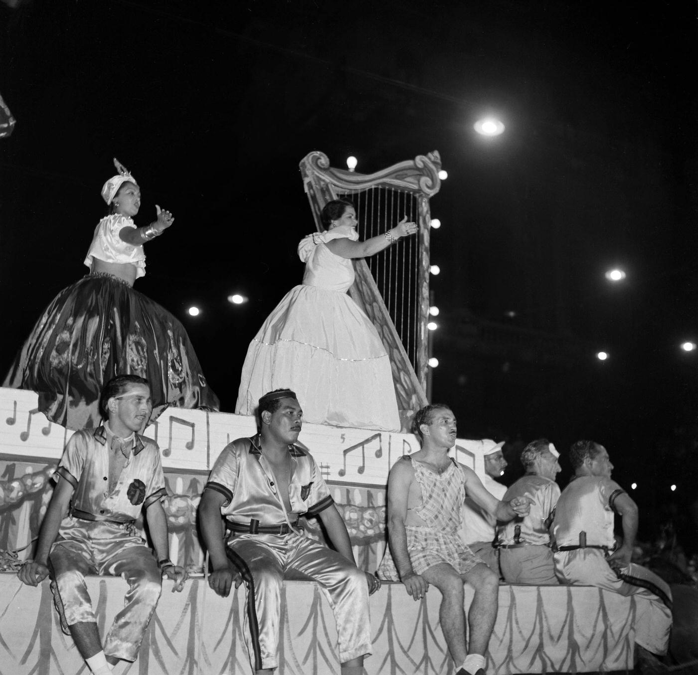 Carnival parade revelers on a float in Rio de Janeiro's Carnival. 1953