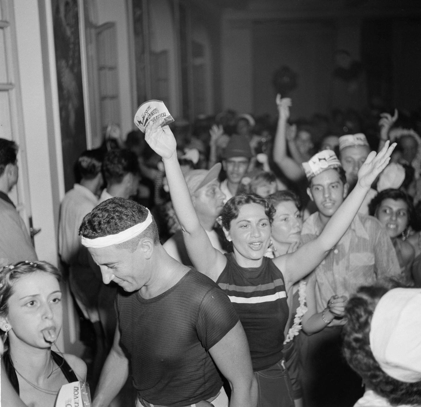 People dance and party during Rio de Janeiro's Carnival. 1953