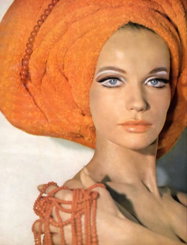 Veruschka with coral beads by Giovanni Apa, Vogue, 1967