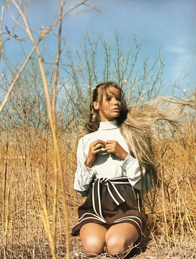 Veruschka in a white turtleneck and a brown dirndl skirt, Fort Davis, Texas, Vogue, 1968