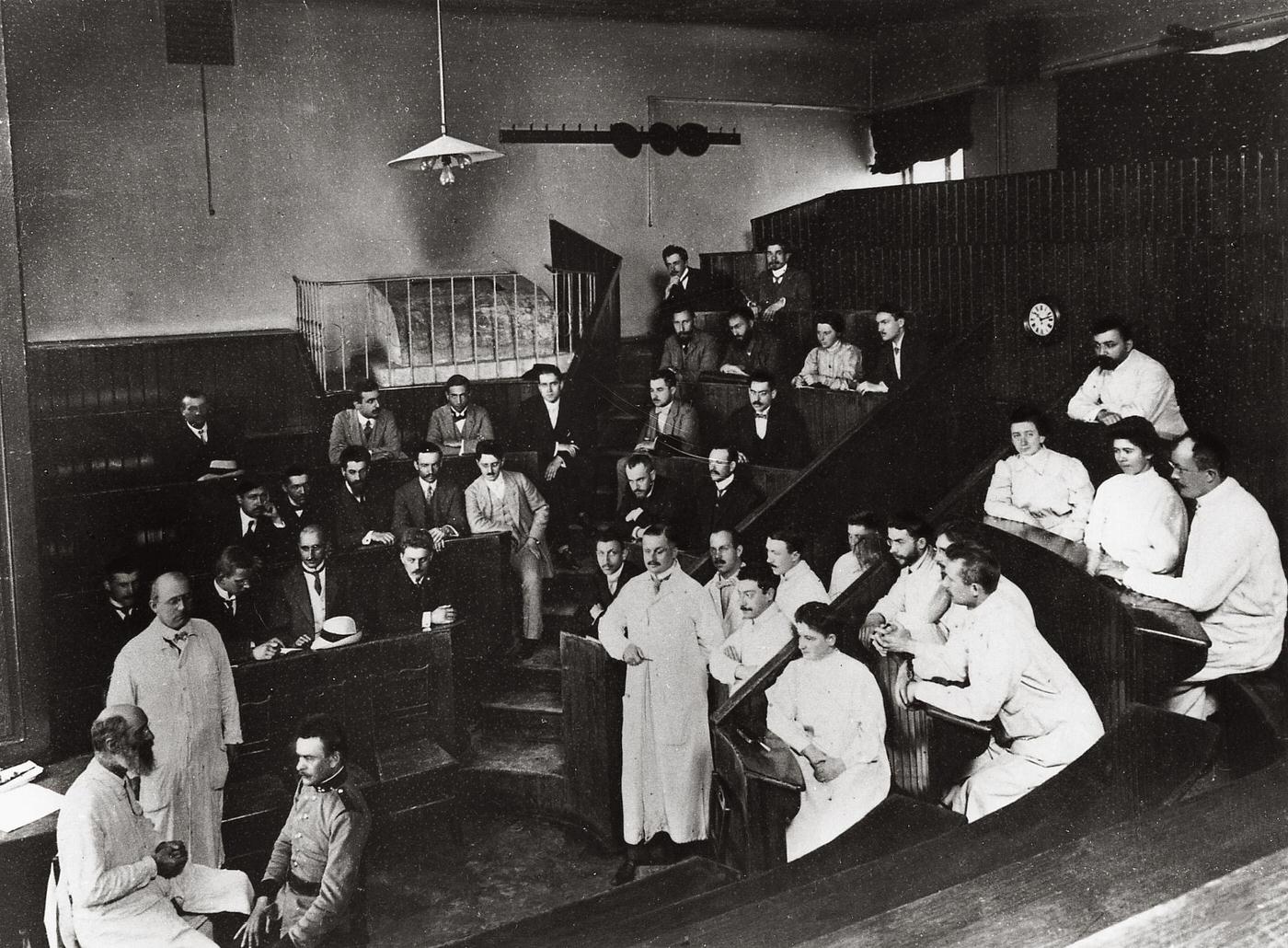 Professor Ernst Fuchs in the Lecture Hall of the University Eye Clinic in Vienna, Around 1900s