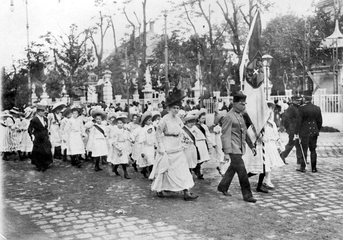 Children process through the streets in celebration of the Austrian Emperor's Jubilee in Vienna, Around 1900