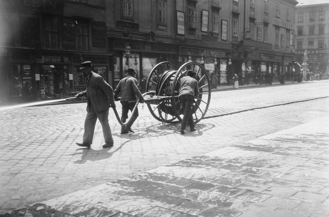 Men are cleaning the Mariahilfer Strasse, Vienna, 1900s