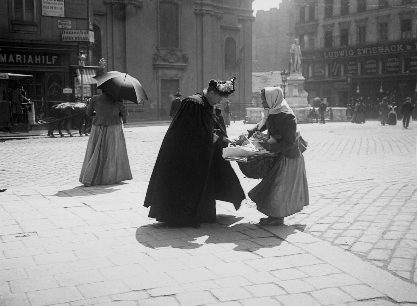 A client with an asparagus dealer, Mariahilfer Strasse, Vienna, 1900s