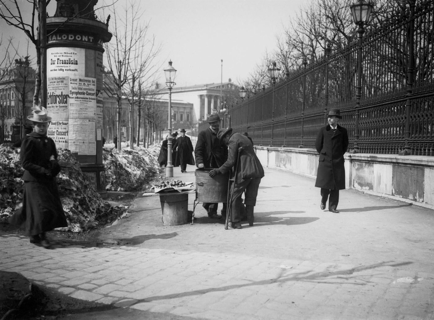 A chestnut dealer at the Burgring, In the background the parliament, Vienna, 1900s