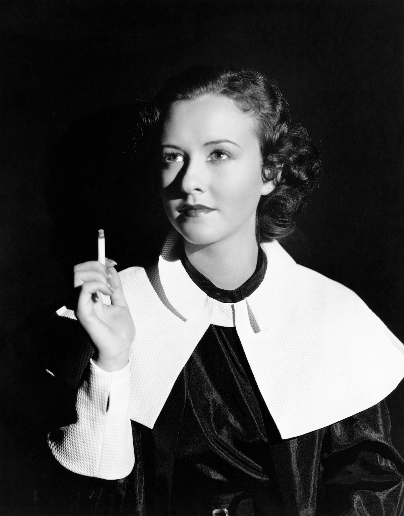Actress Margaret Lindsay Smoking Cigarette