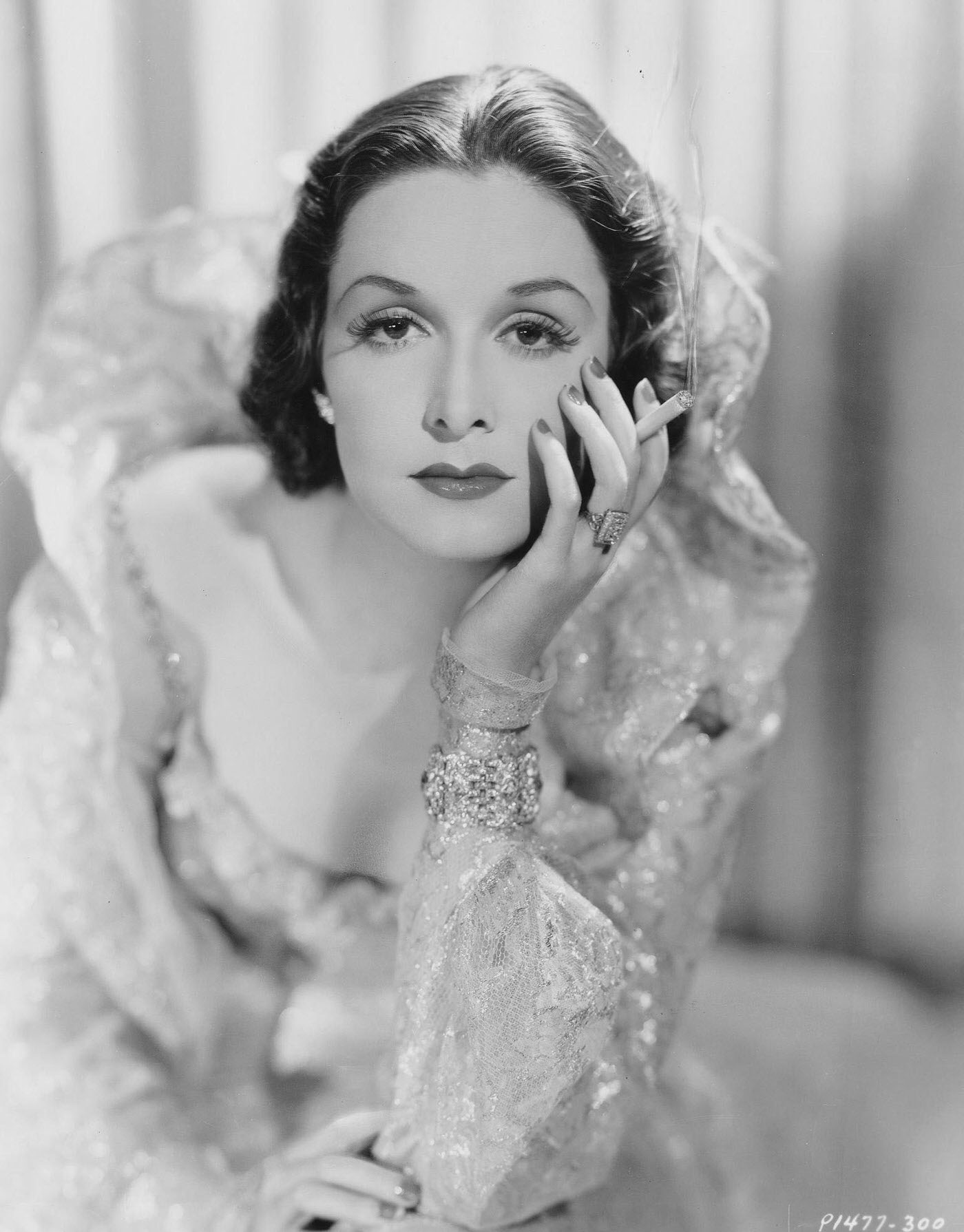 Actress Gail Patrick Holding Cigarette