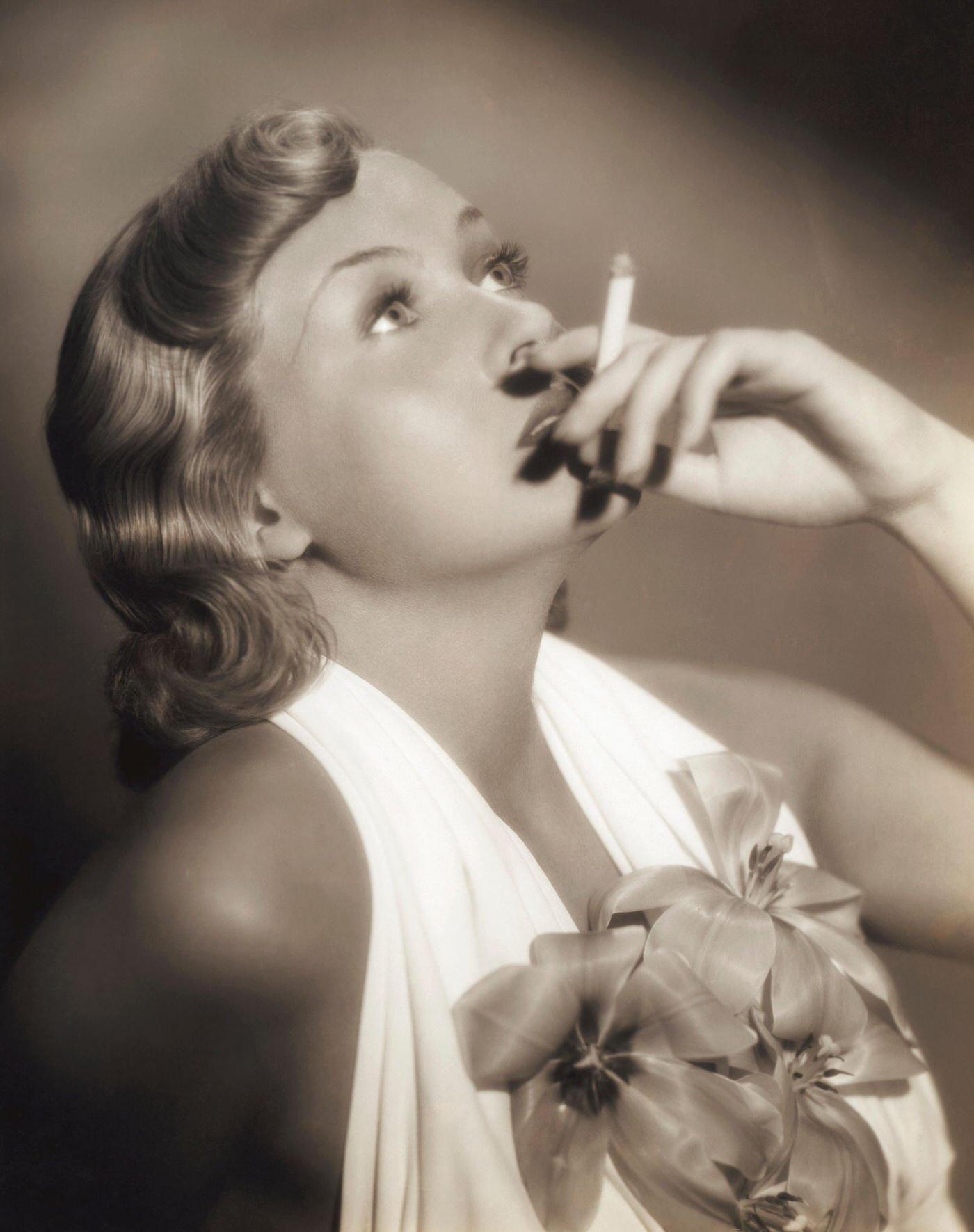 Actress Patricia Ellis Smoking Cigarette