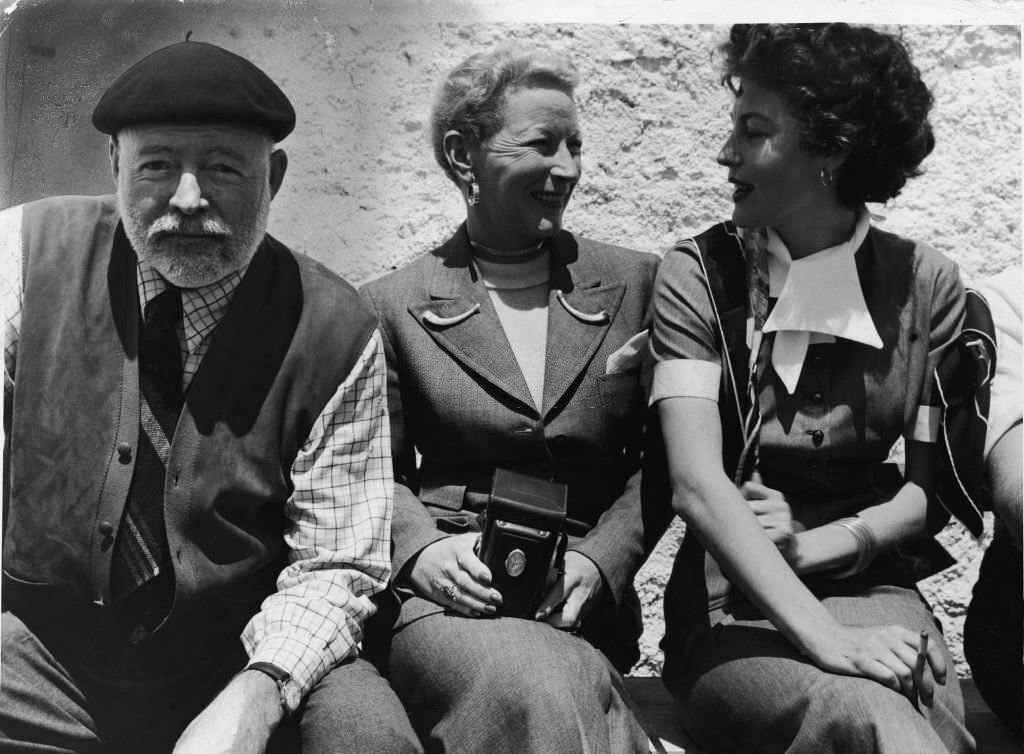 Ernest Hemingway with his wife Mary Welsh Hemingway and actress Ava Gardner in the mid to late 1950s.