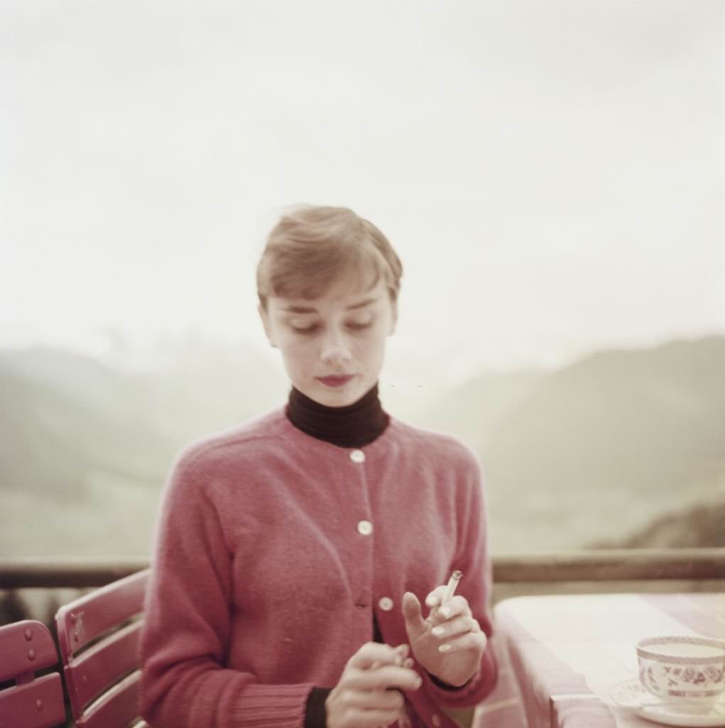 Audrey Hepburn on the terrace of the Restaurant Hammetschwand in Switzerland, 1955.