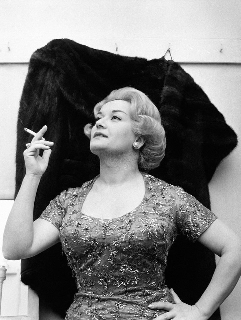 Italian singer Flo Sandon's posing with a cigarette in April, 1960.