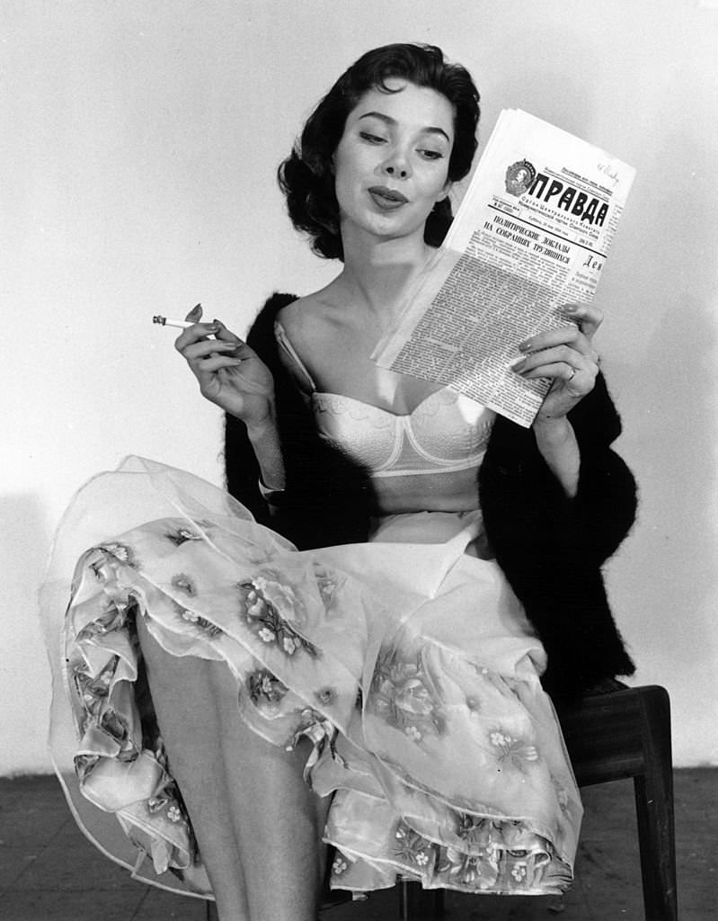 A Russian girl models British underwear in a sales campaign, 1956.