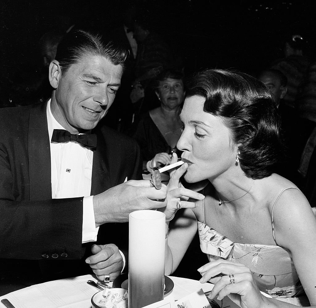 Actor Ronald Reagan and wife Nancy attend the premiere party for "Moby Dick" in Los Angeles, 1956.