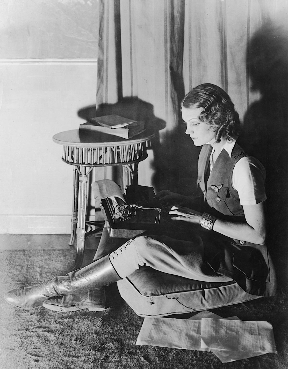 Aloha Wanderwell typing on Remington
