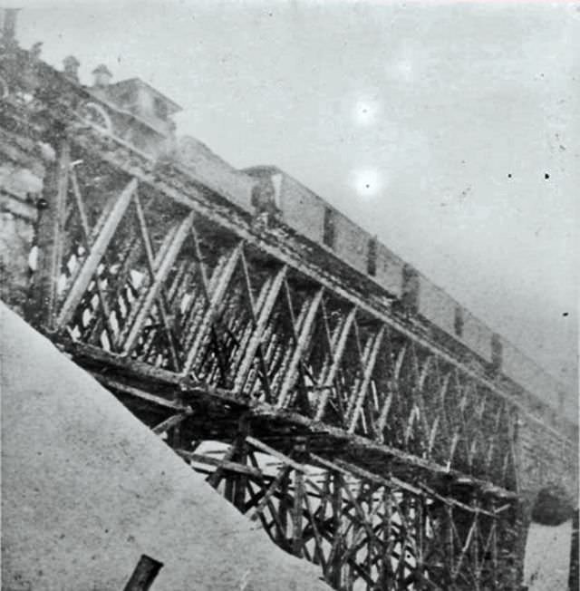The Lake Shore & Michigan Southern Howe Truss Ashtabula River Bridge. Noting the cribbing below. A temporary construct after the 1876 collapse, before the concrete arch bridge was built