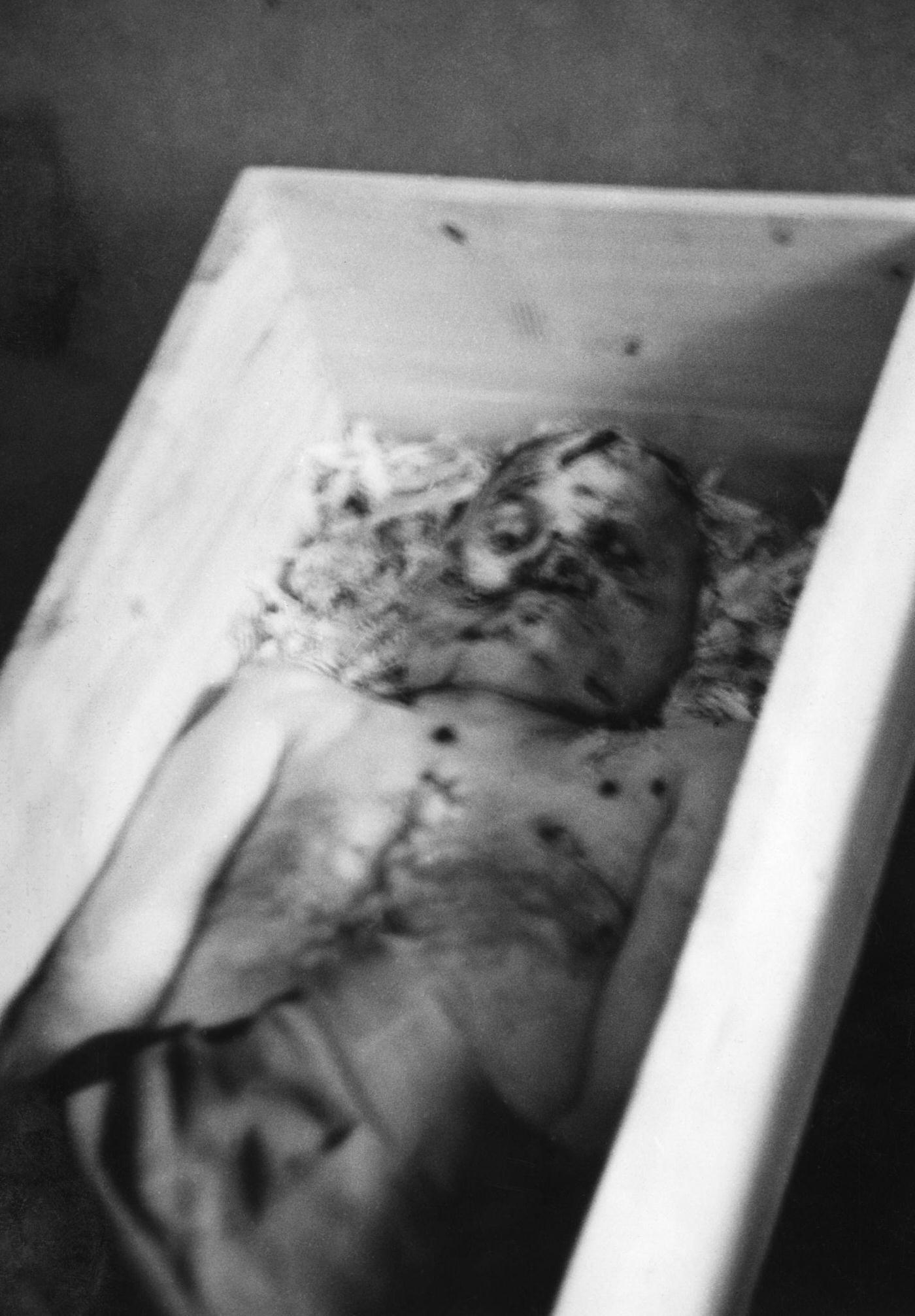 Benito Mussolini's Corpse in Coffin Viewed by Italians in Milan, 1945