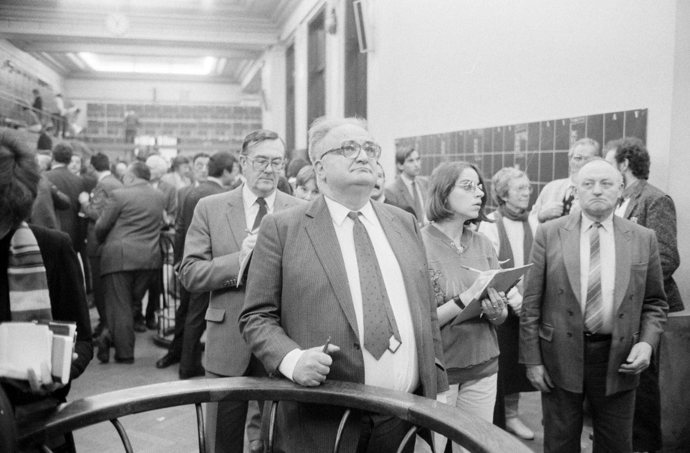 Broker Examining the Value Board at the Brussels Stock Exchange, 1987