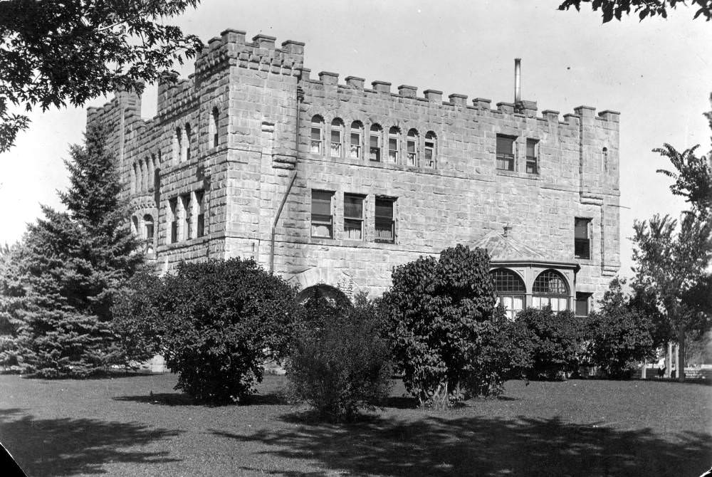 Dean Peck's Training School for Girls in Denver, stone building with arched windows, 1900s