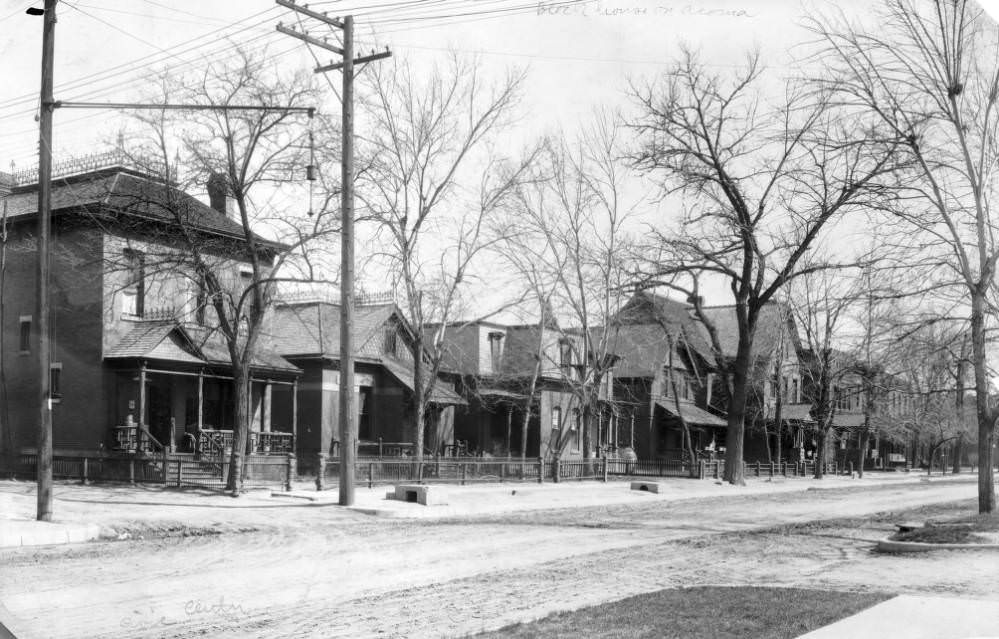 Houses on Acoma Street with Covered Porches and Metal Fences, 1900s
