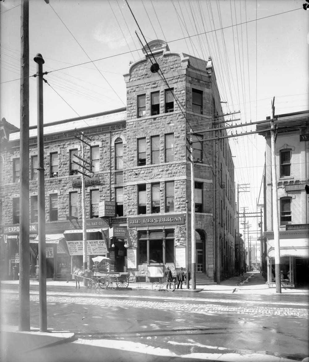 Denver Republican Newspaper building at 1118 16th Street, featuring pedestrians and storefronts, 1900s