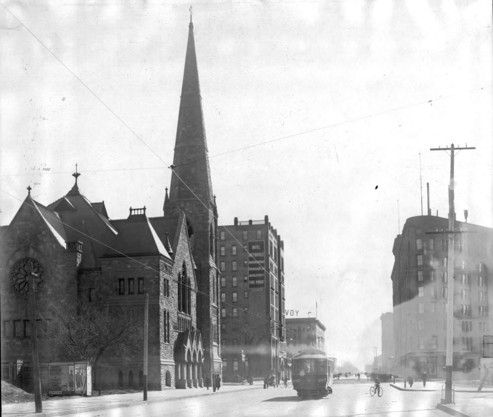 Trolley number 237 on Broadway, featuring various landmarks and billboards, 1905.