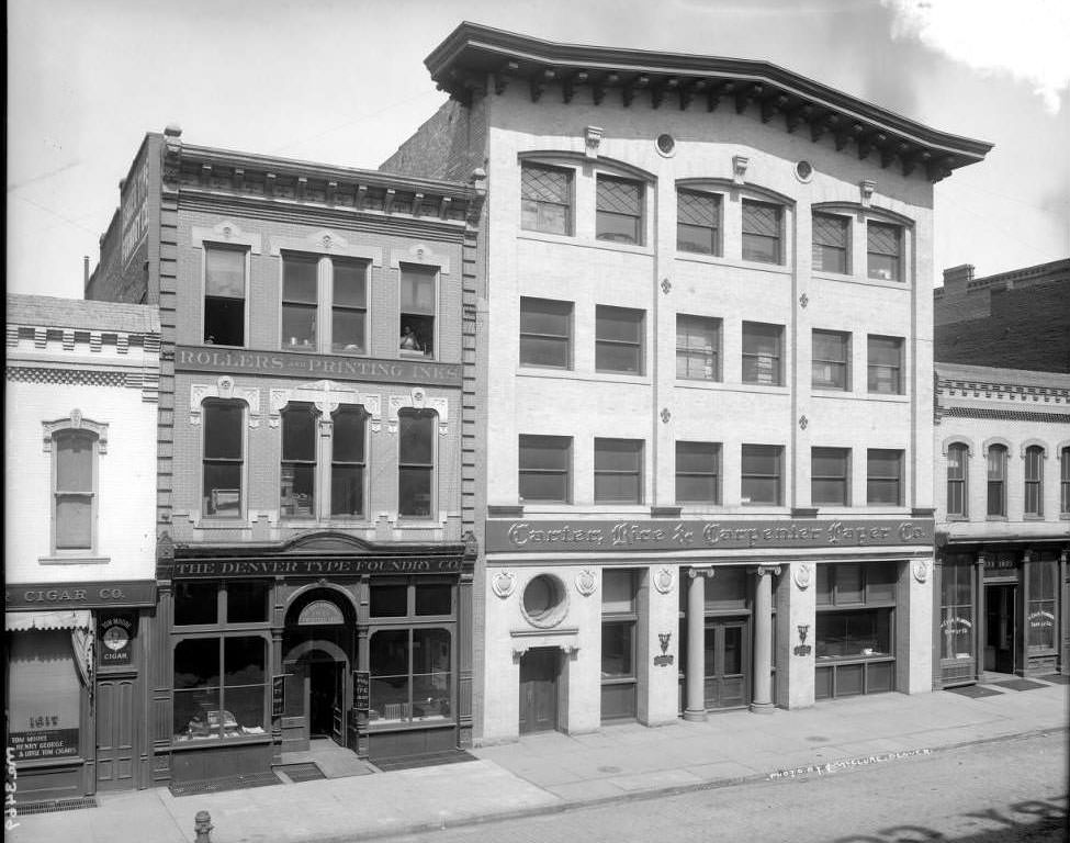 Businesses on Blake Street, featuring various types of signage, 1905