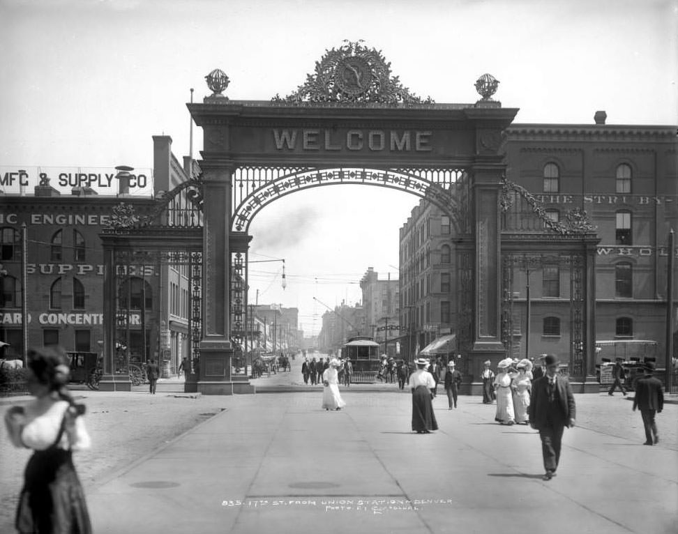 View of 17th Street from Union Station, featuring Welcome Arch and Hendrie-Bolthoff building, 1906