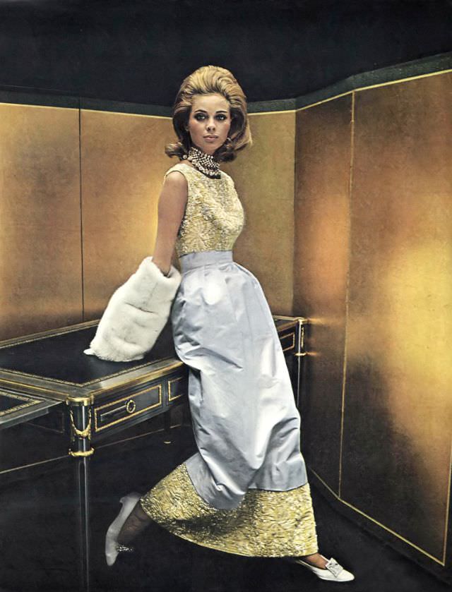 Camilla Sparv in a gown of white satin and embroidered yellow velvet, October 1964