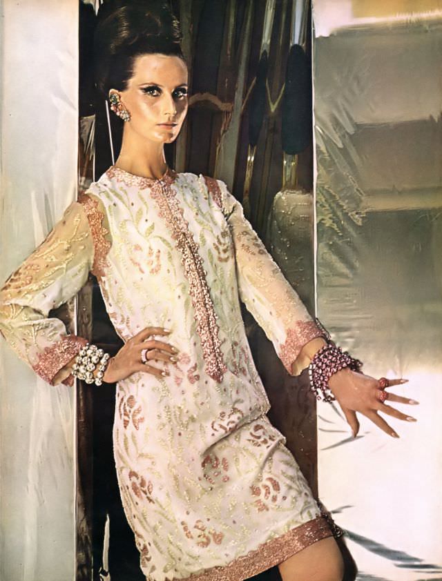 Bettina Lauer in a shift of pale beads on white chiffon by Leslie Morris, October 1965