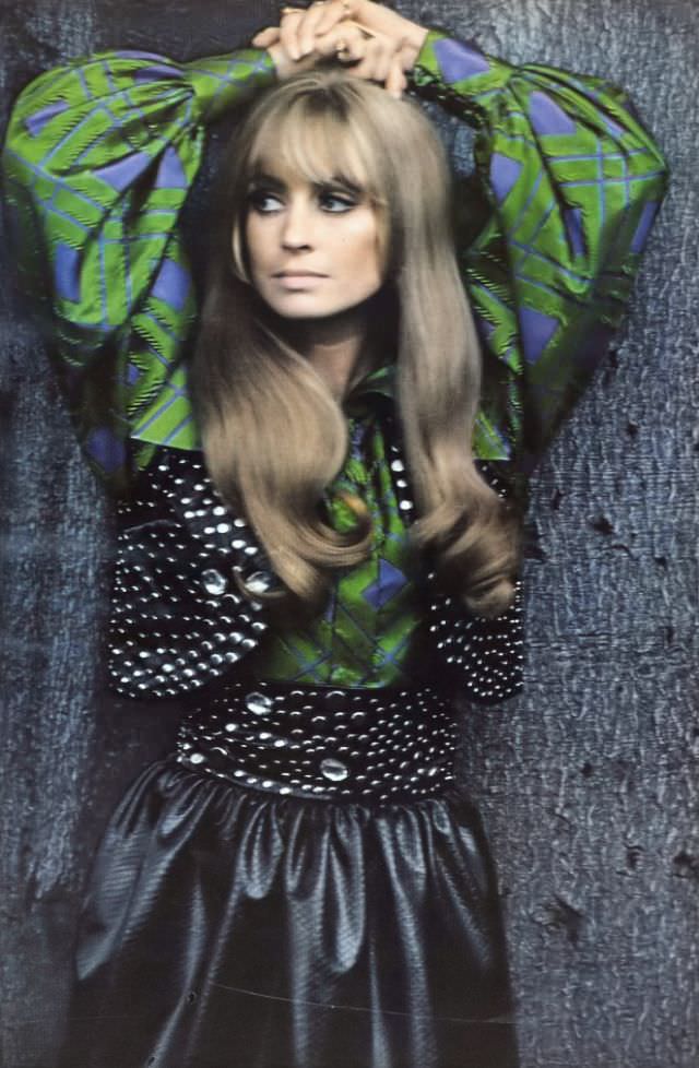 Suzy Kendall in a fake-snake ensemble over an emerald plaid shirt, September 1968