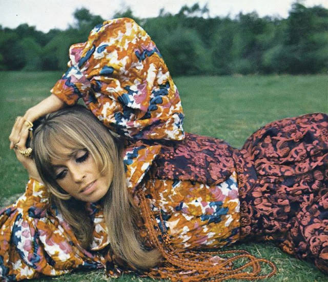 Suzy Kendall in a black vinyl cobra ensemble with red-beaded embroidery, September 1968