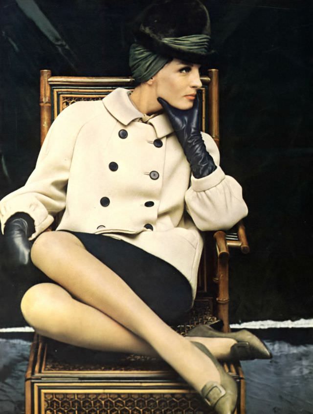 Mirella Petteni in whipcord topcoat and black skirt by Seymour Fox, September 1963