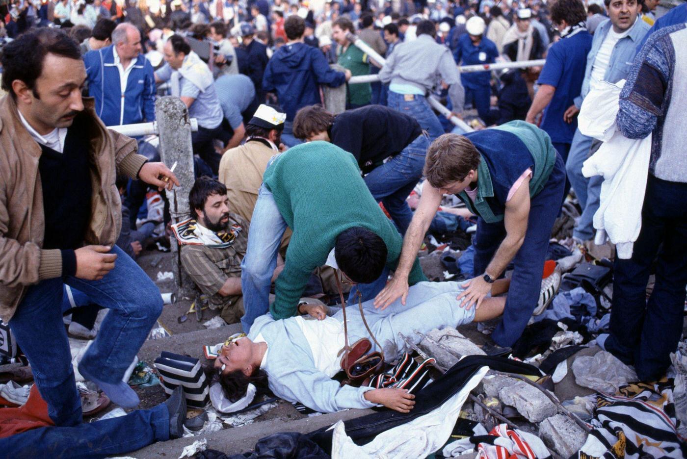 Fatally injured fans on the Juventus terrace during European Cup Final at Heysel Stadium, 1985.