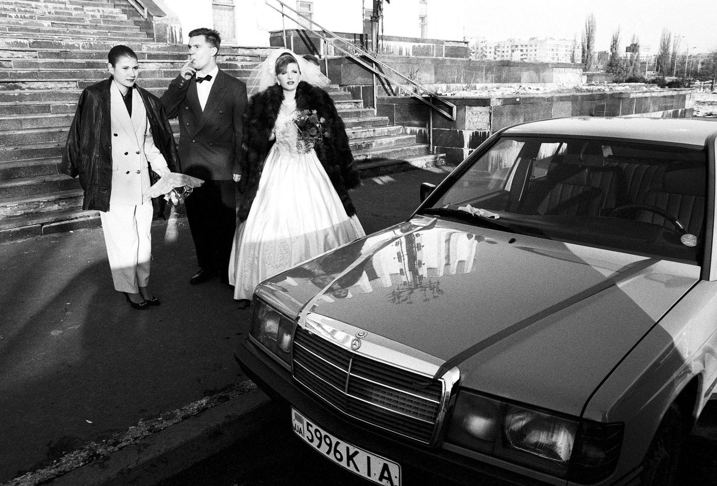 Newlyweds Pose with Their Mercedes-Benz in Kiev