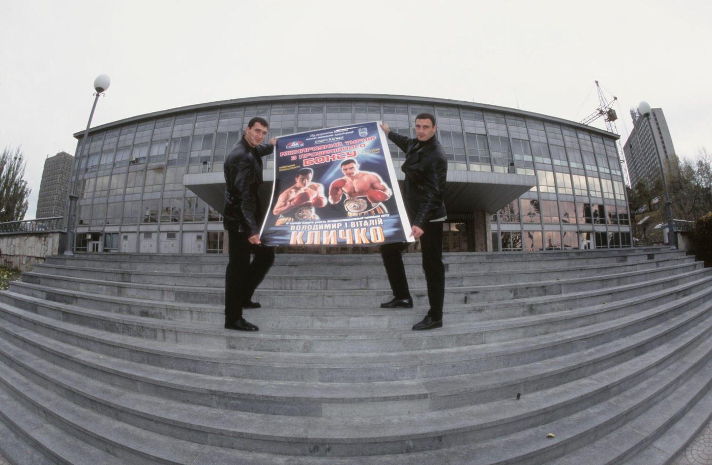 Ukrainian Boxers Vitali and Wladimir Klitschko Hold Fight Promotion Poster in Kyiv, 1998