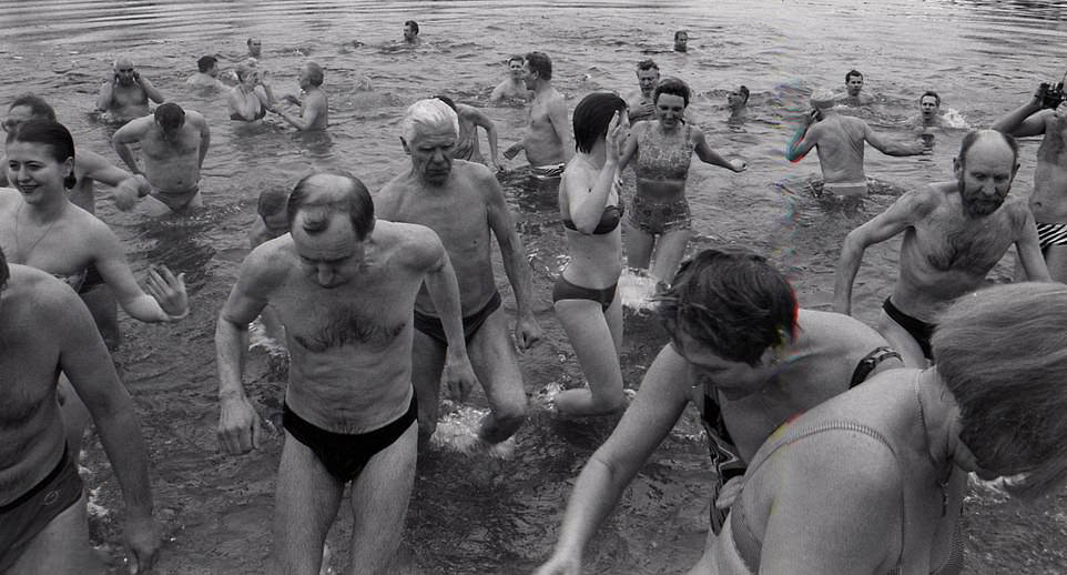Cold Plunge: Ukrainians of all ages participate in a freezing New Year's swim