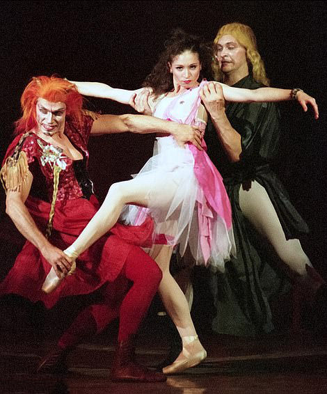 Devil's Dance: Elena performs a ballet alongside a devil-dressed man